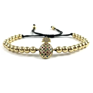 Luxury arany ananászos cord karkötő